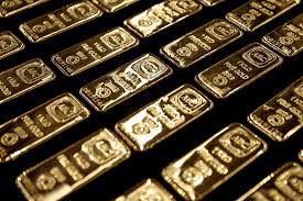 Gold Steady Near Record High as Traders Digest Fed Rate Views