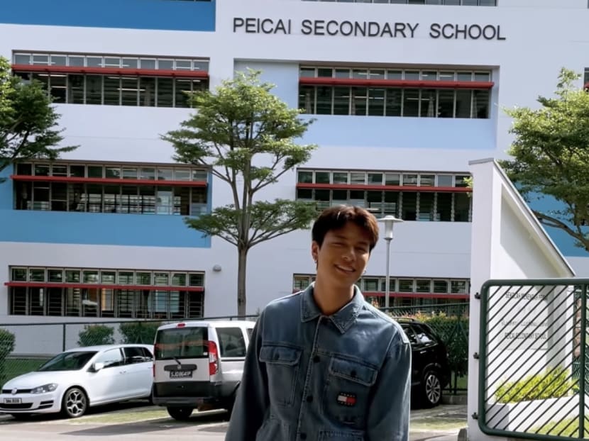 Ah Girls Go Army star Glenn Yong visits secondary school juniors, autographs their uniforms