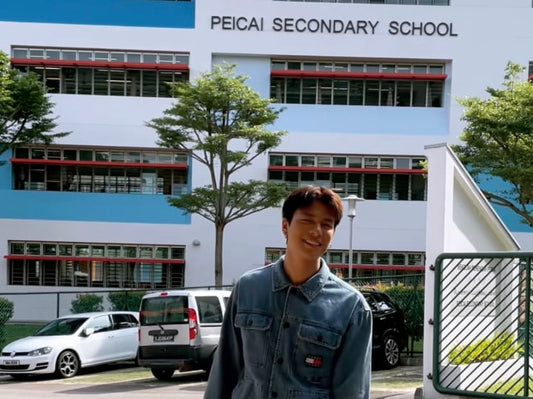 Ah Girls Go Army star Glenn Yong visits secondary school juniors, autographs their uniforms